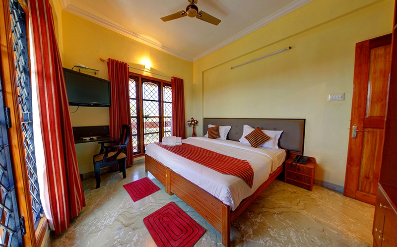 View of Room with Double Bed in MK Greens Gardenia Mysuru